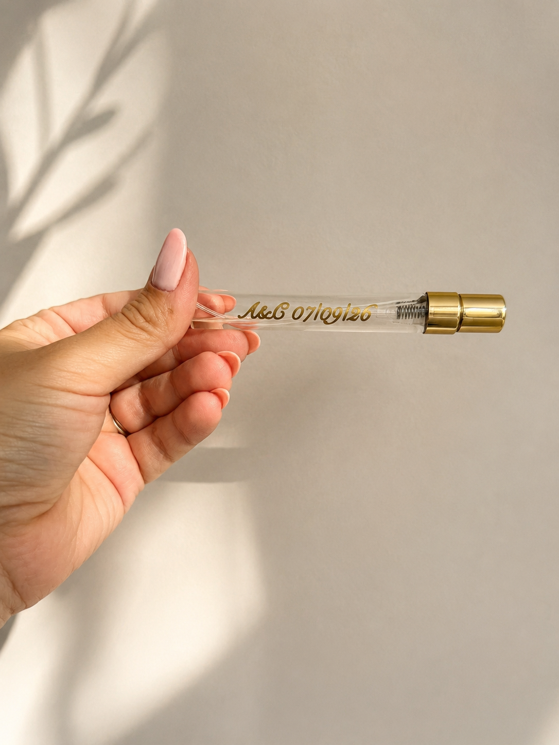 Personalised refillable perfume bottle